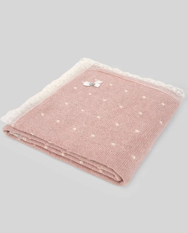 Girl's knitted blanket in powder pink